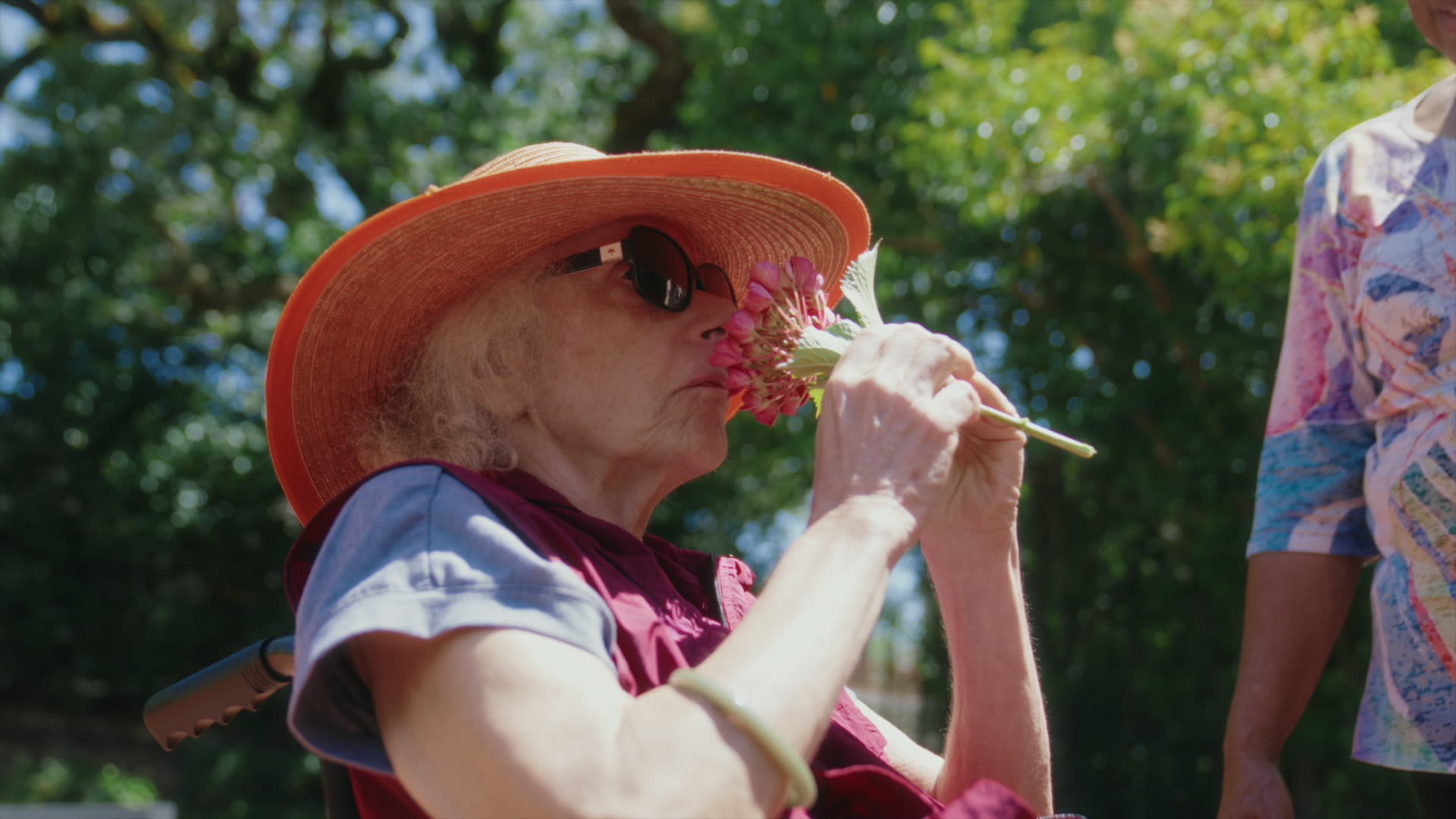 At Home Caregivers client enjoying the garden